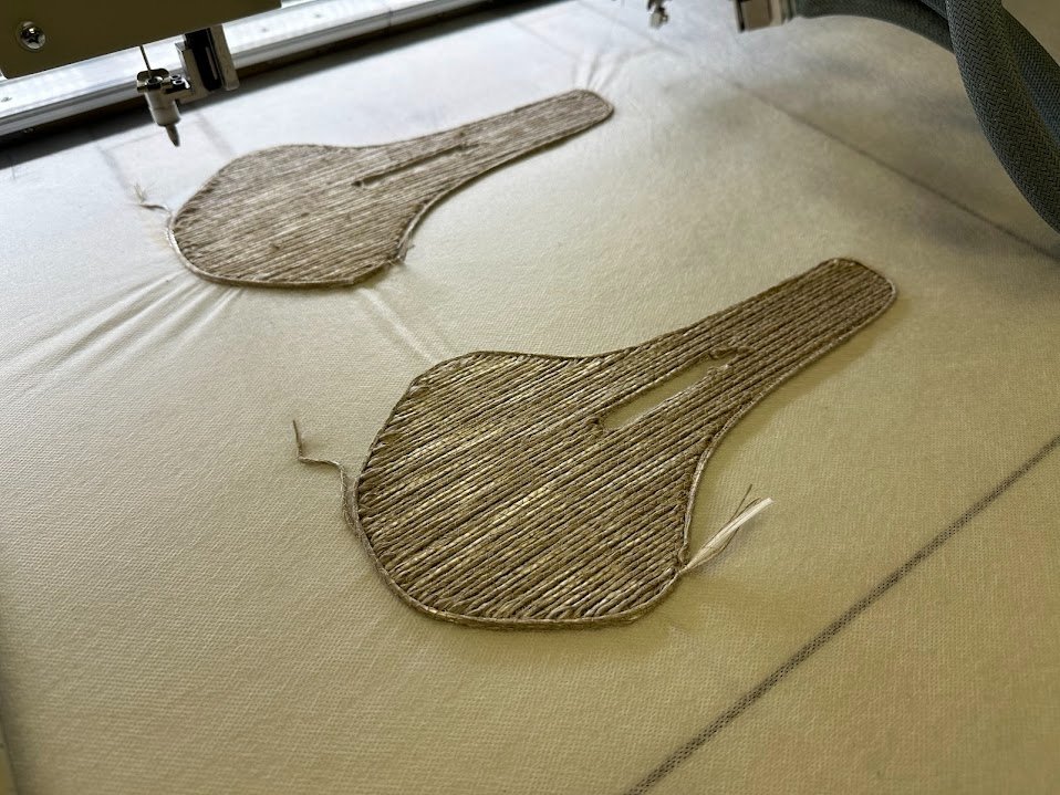 Natural fiber composite bike seat preforms