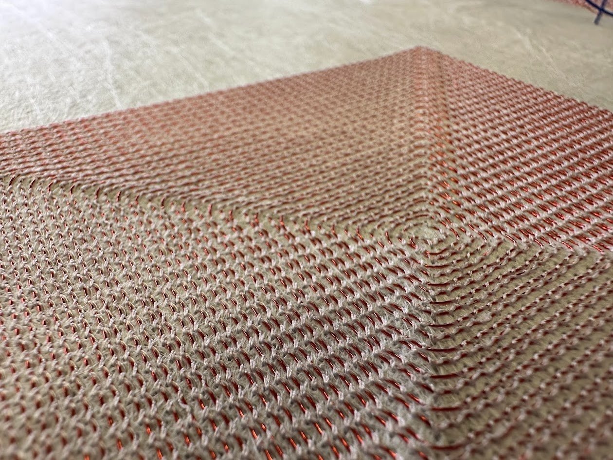 Couched copper wire spiral heating element