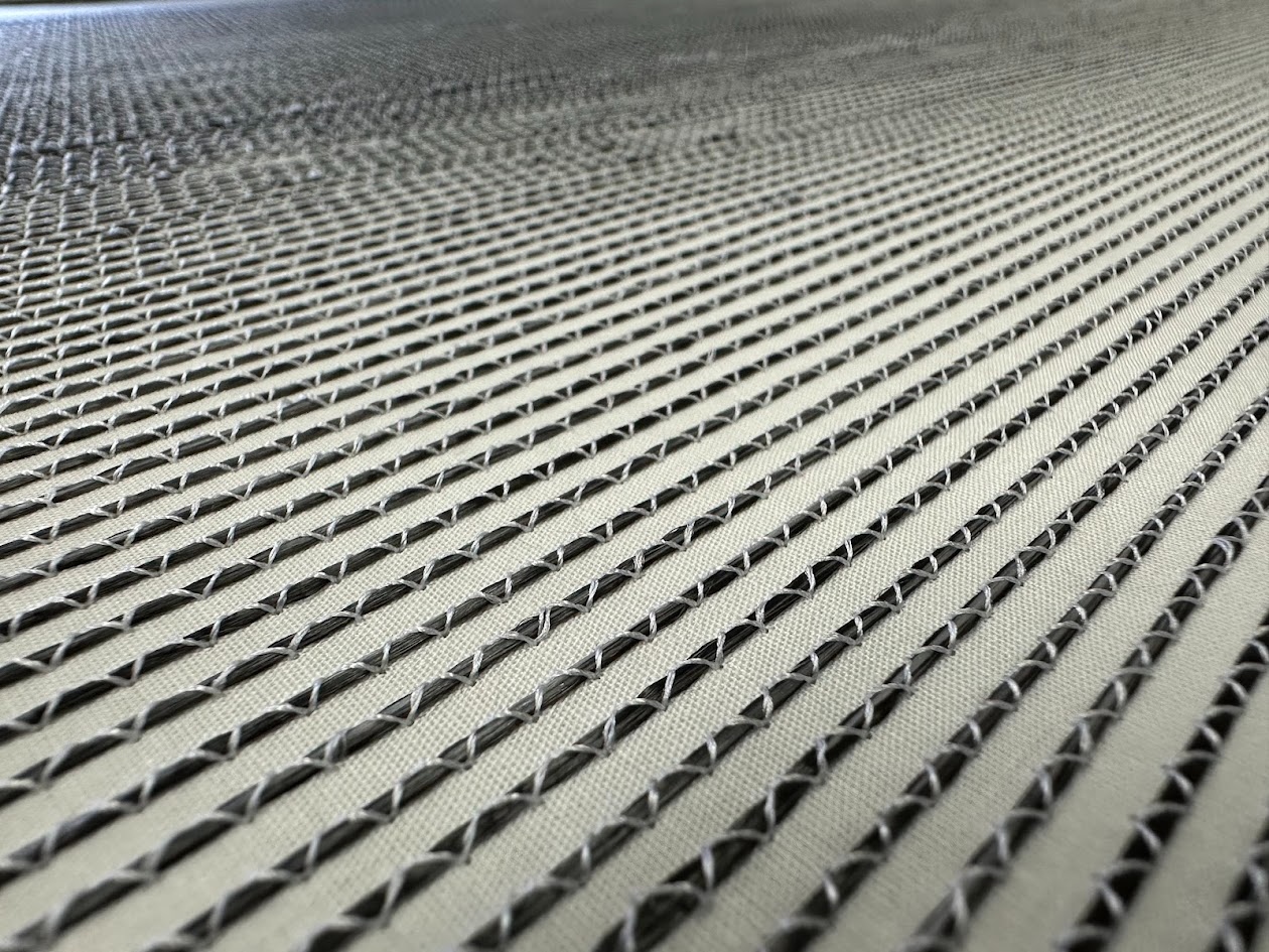 Flat tailored carbon tow preform